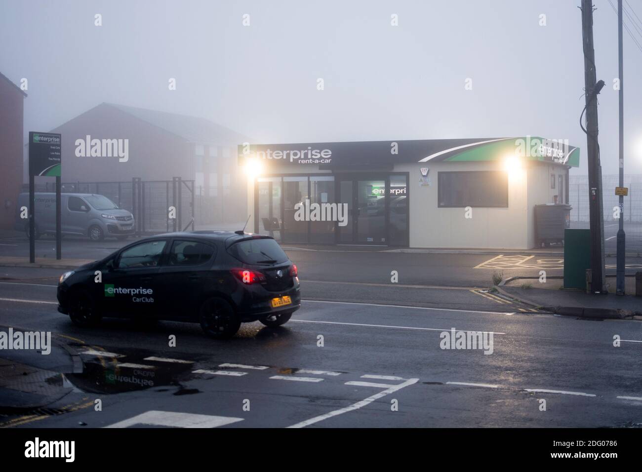 Enterprise rent-a-car office on a foggy winter`s day, Warwick, UK Stock Photo